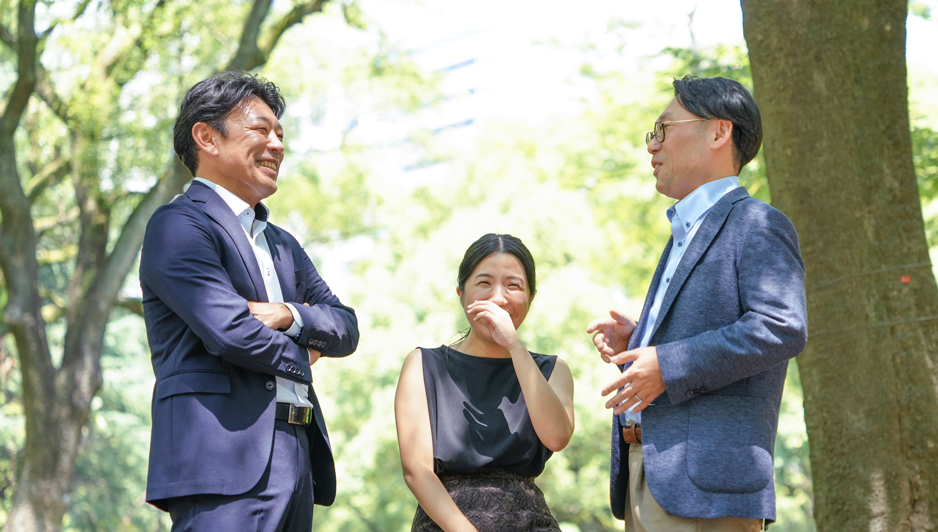 Three person talking